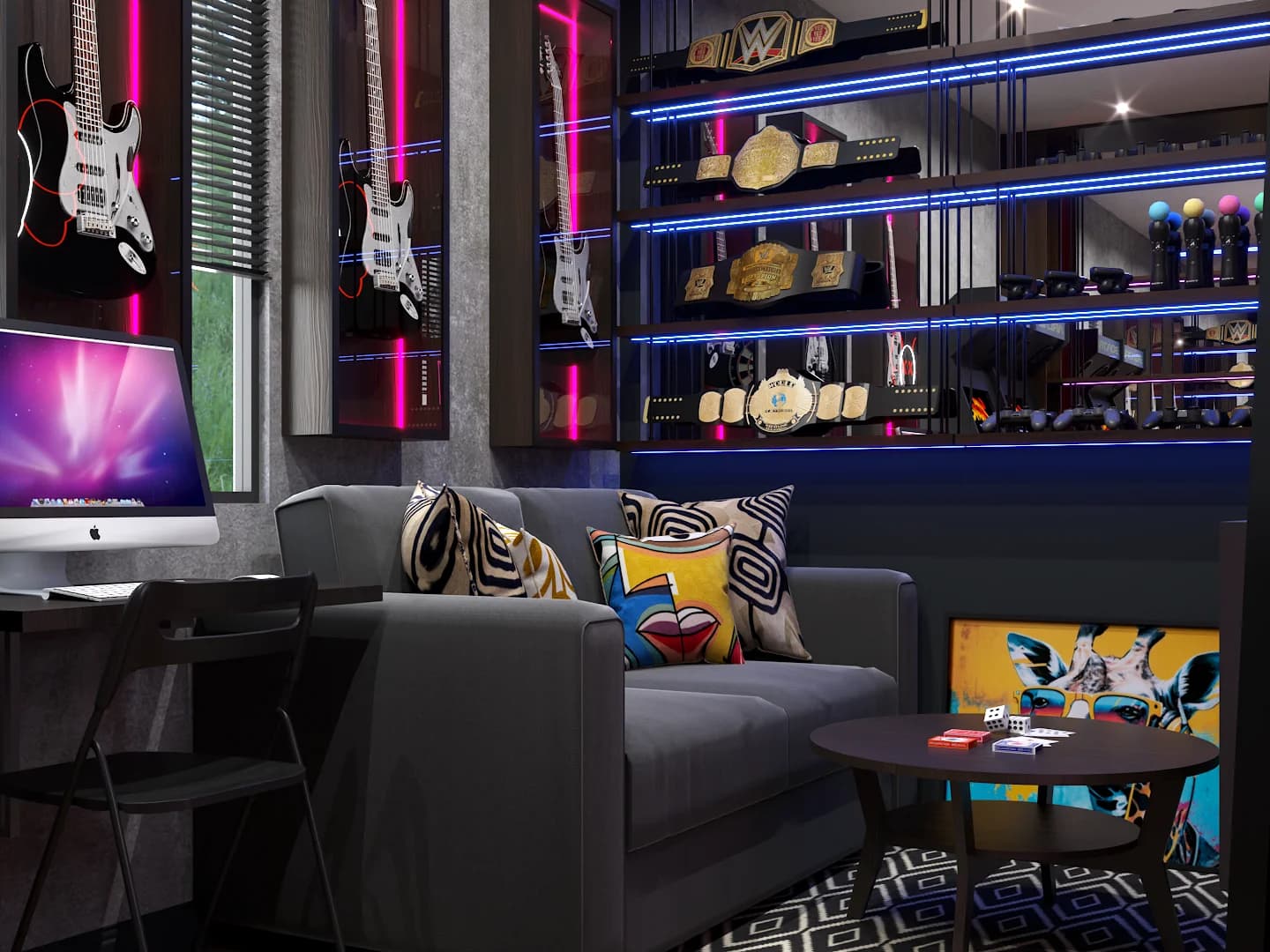 Framed guitar collection above gray sofa with pillows and Apple monitor workstation