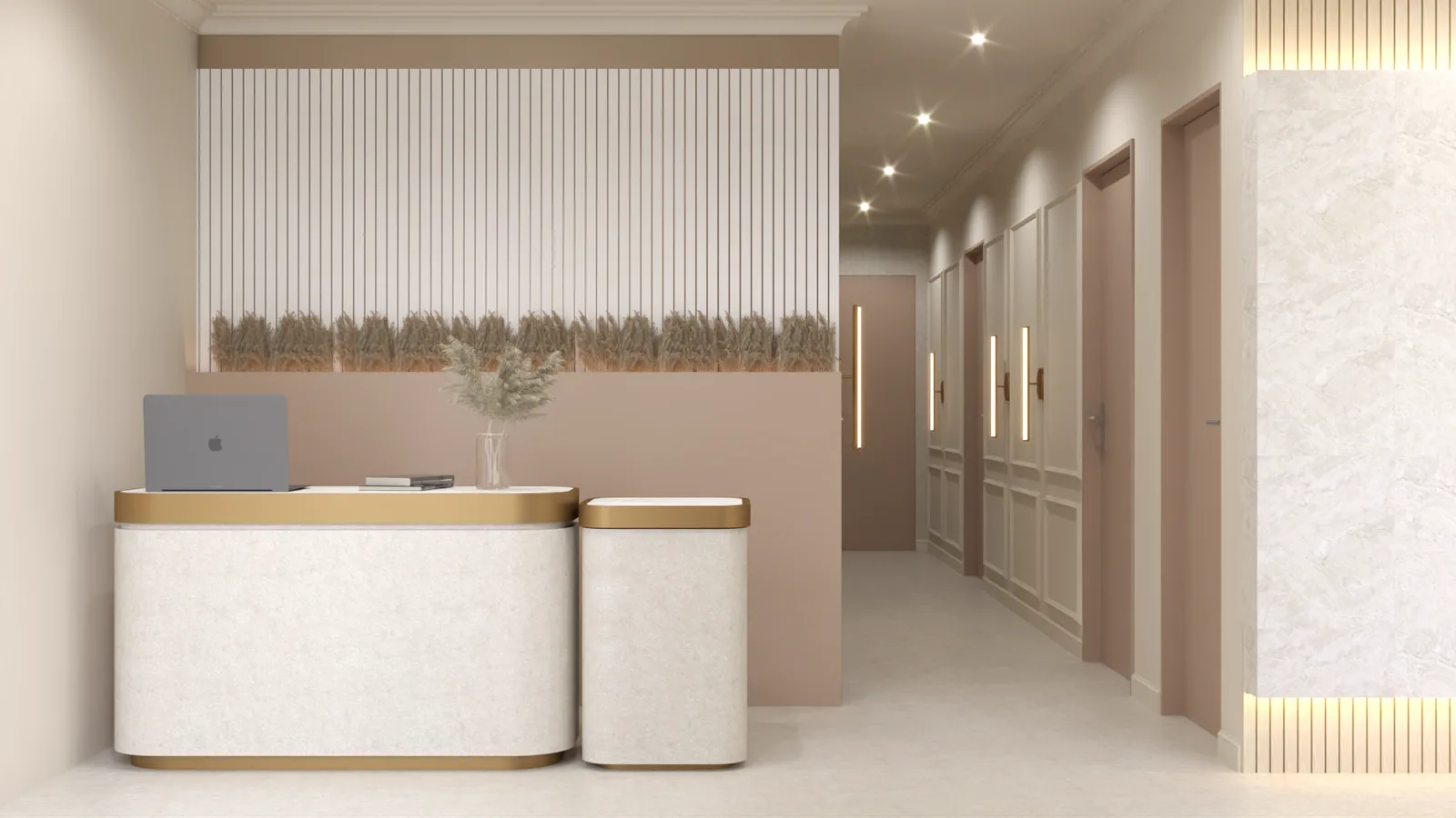 Rounded cream reception desk with gold trim, pampas wall, and paneled corridor