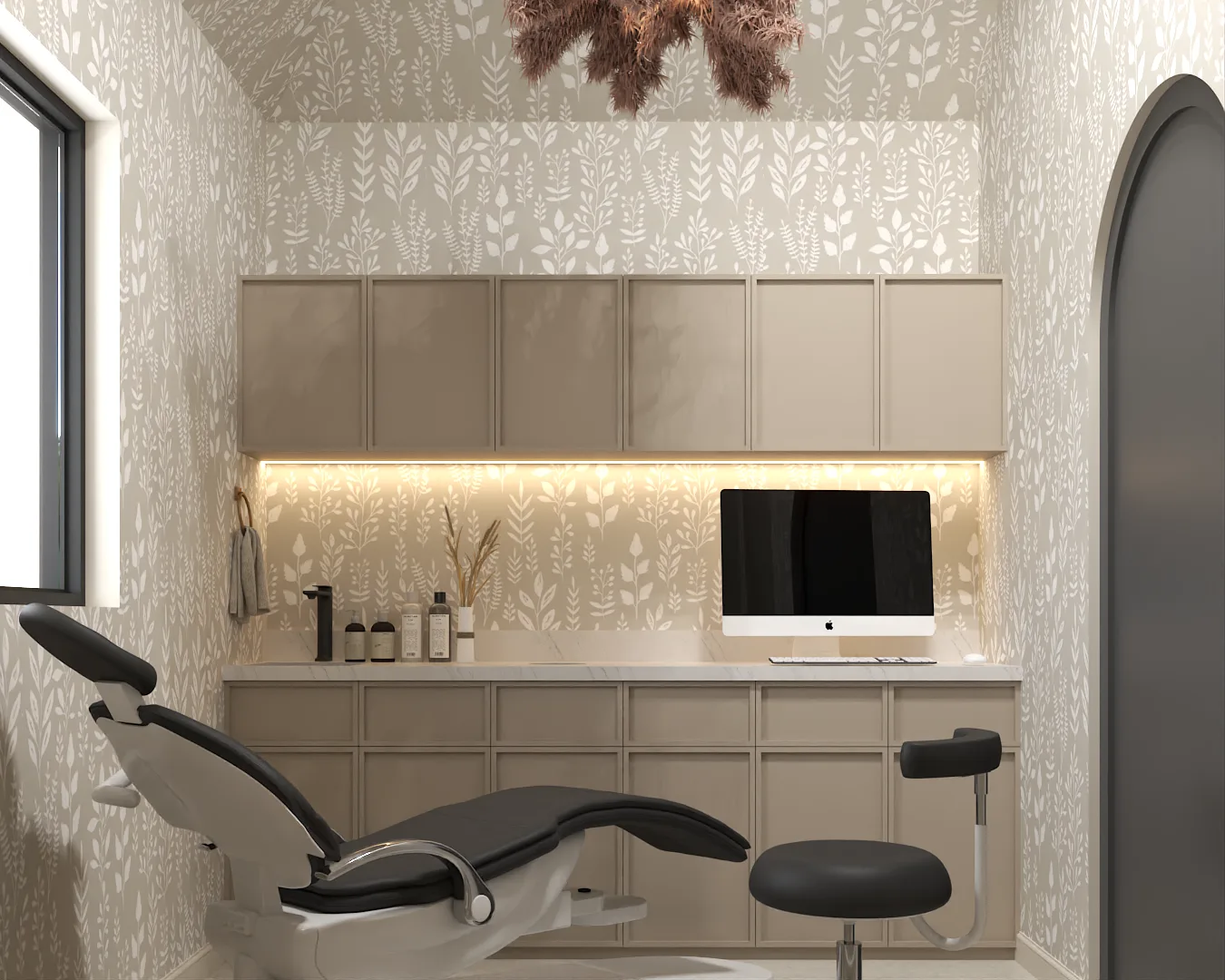 Treatment room with botanical wallpaper, aesthetic chair, and beige cabinets