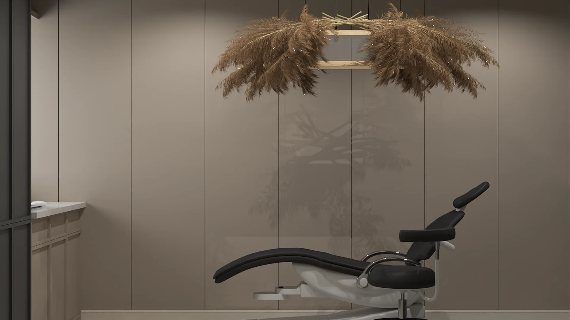 Spa treatment room with taupe fluted wall panels, pampas grass pendant light, and black reclining chair