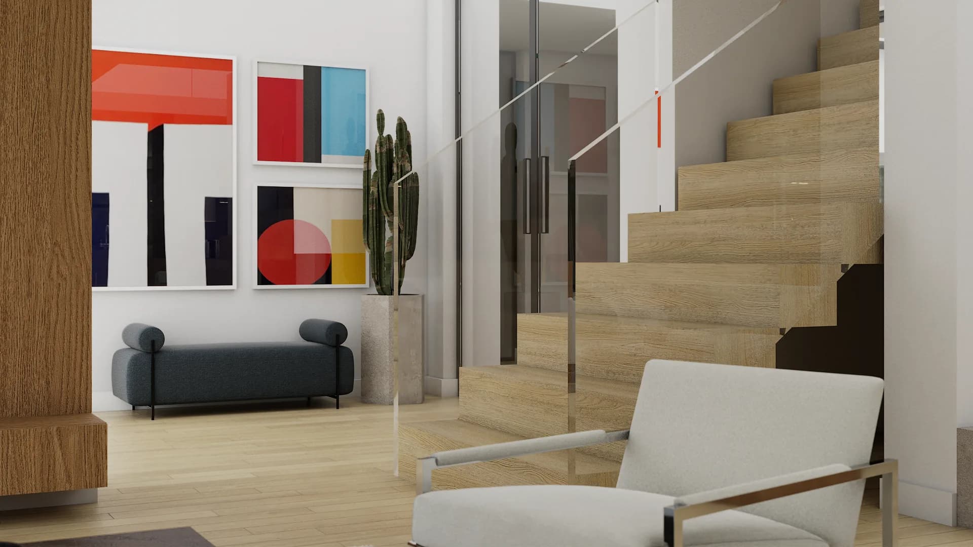 Glass-railed staircase from entry angle with abstract gallery wall and cactus