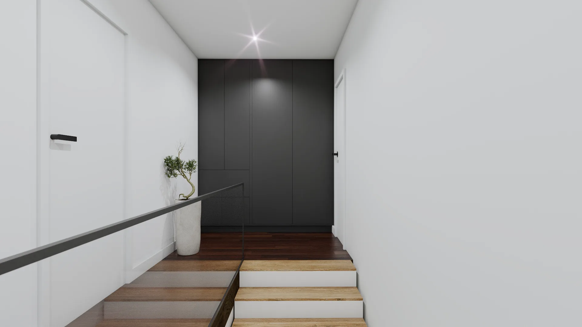 Oak treads on white risers descending toward charcoal recessed-panel accent wall with black handrail