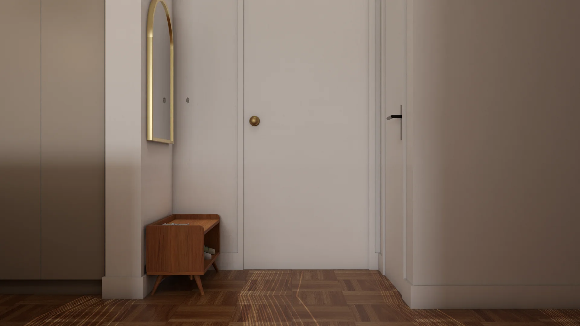 Entry foyer with gold arch mirror, walnut shoe bench, and white paneled doors on herringbone floor