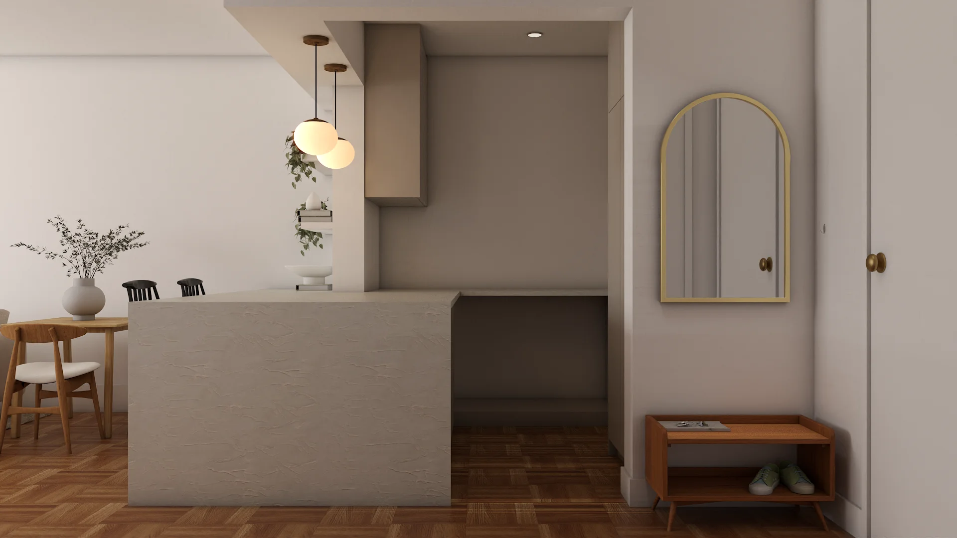 Hallway view into studio showing stone kitchen island with globe pendants and gold arch mirror