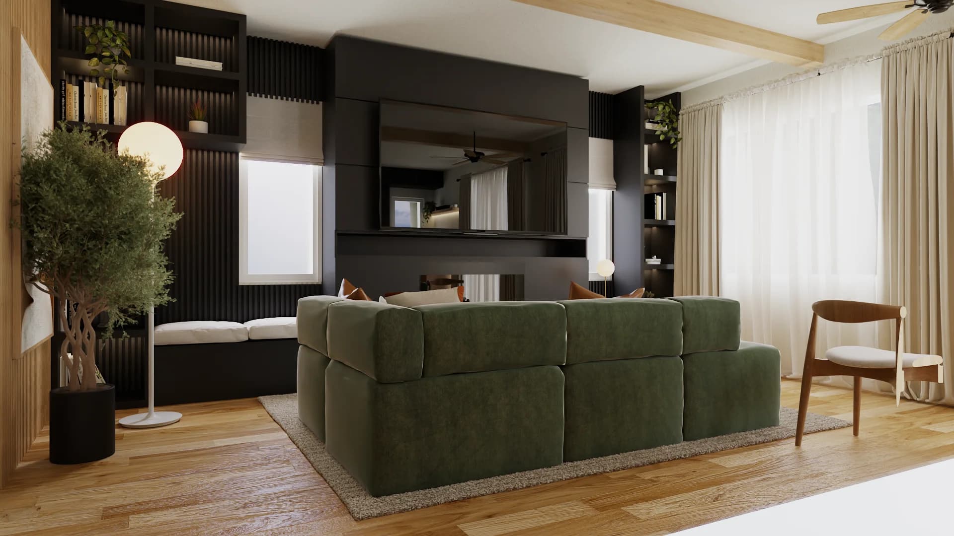 Living zone with green sectional, black fireplace media wall, olive tree, reading bench, and globe lamp