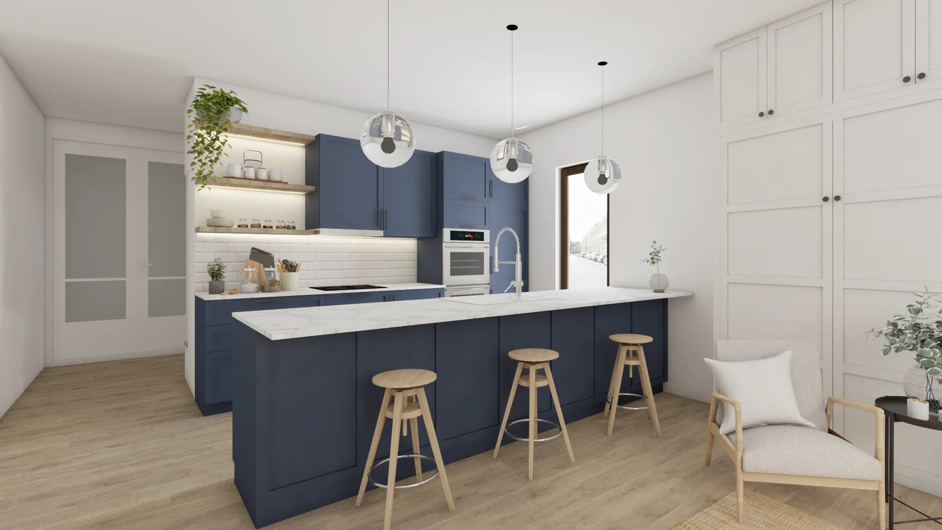 Navy shaker kitchen with white marble countertop, oak bar stools, and glass globe pendants