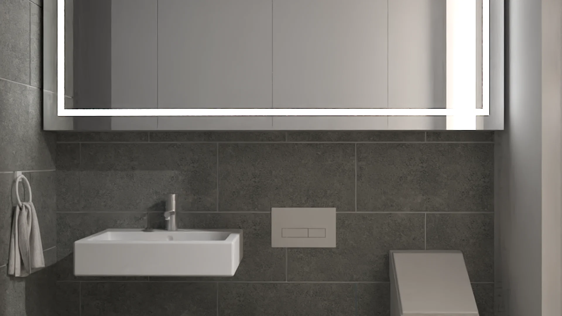 Studio bathroom with floating white sink, wall-hung toilet, and full-width LED mirror
