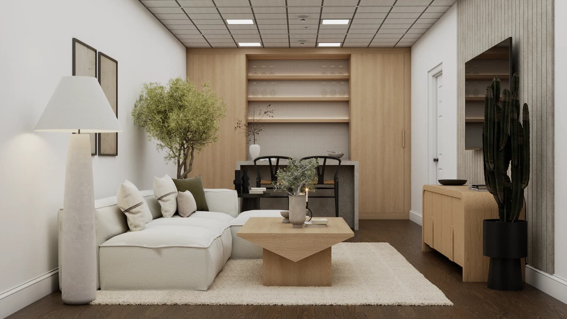 Built-in wood niche with desk and wishbone chairs, white sectional, olive tree in japandi studio