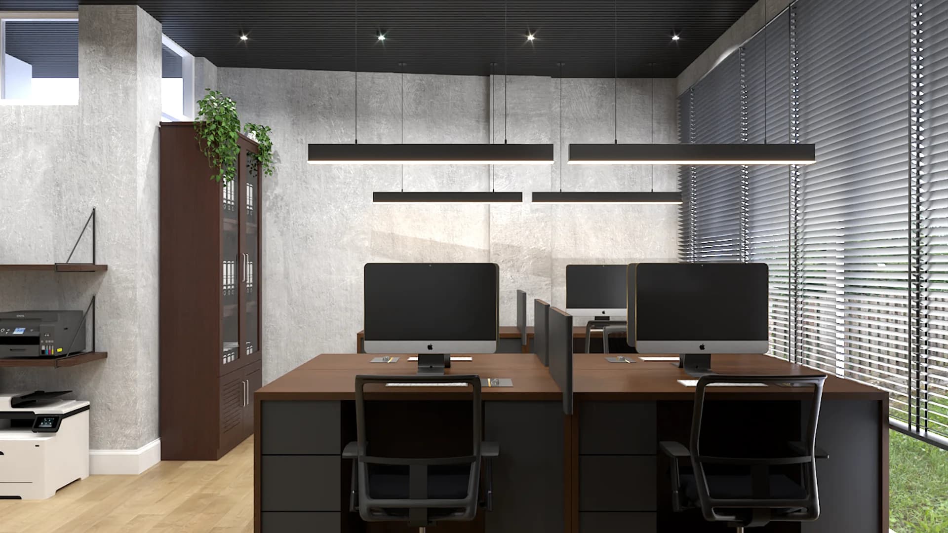 Open workstation island with concrete panel wall, linear pendant, and glass partition with four iMacs