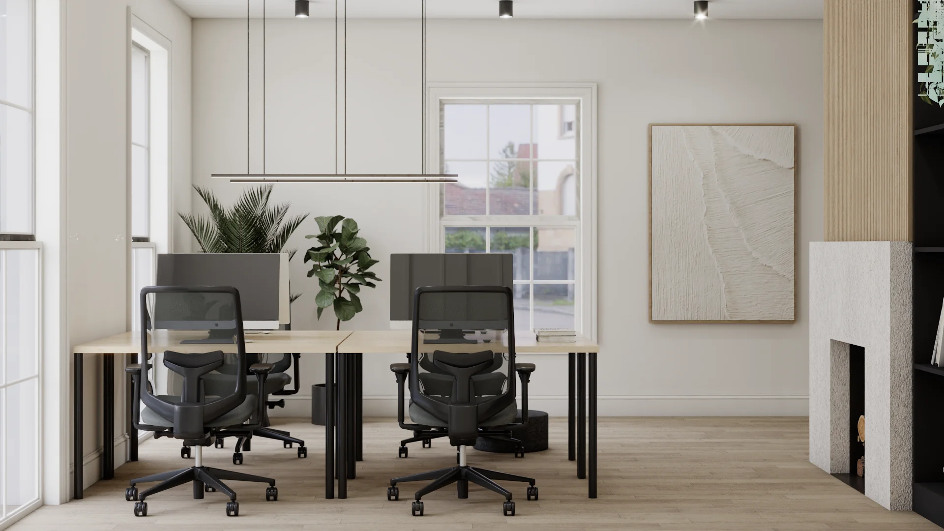 Four-desk open office viewed from the fireplace side showing maple bench desks, black mesh ergonomic chairs, dual monitors, two linear pendant lights, white plaster fireplace with active flame at right, textured white canvas art, palm and fiddle leaf plants