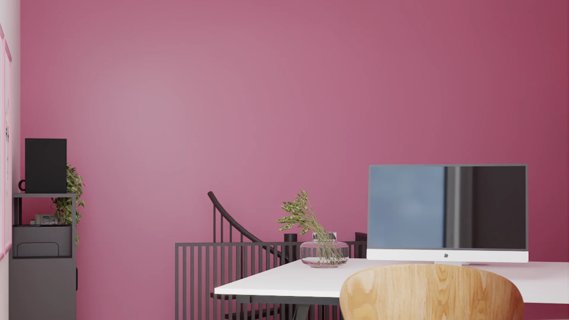 Upper mezzanine desk against pink wall with staircase railing and open shelving