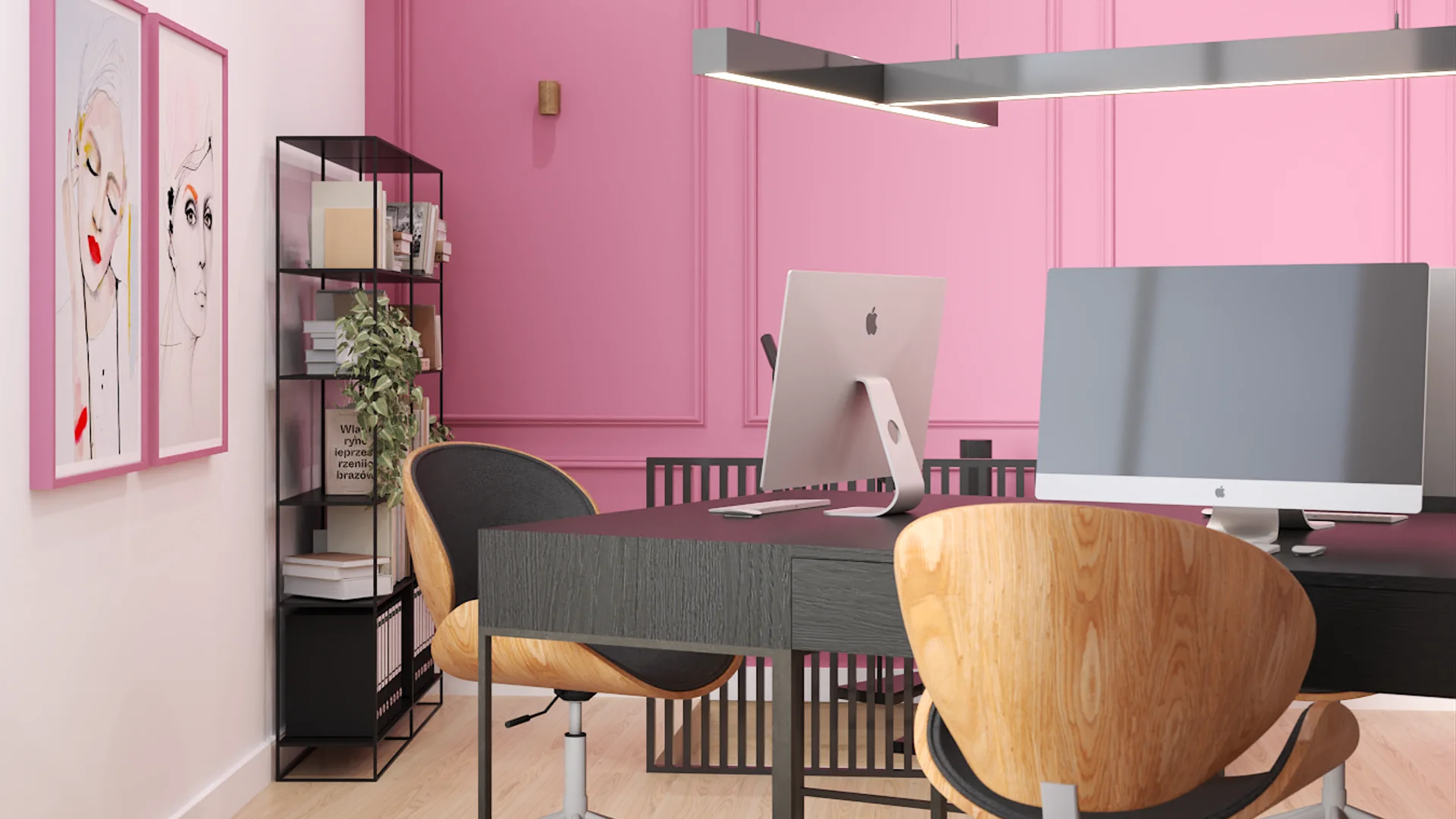 Pink paneled wall corner with two iMac workstations and dark open shelving