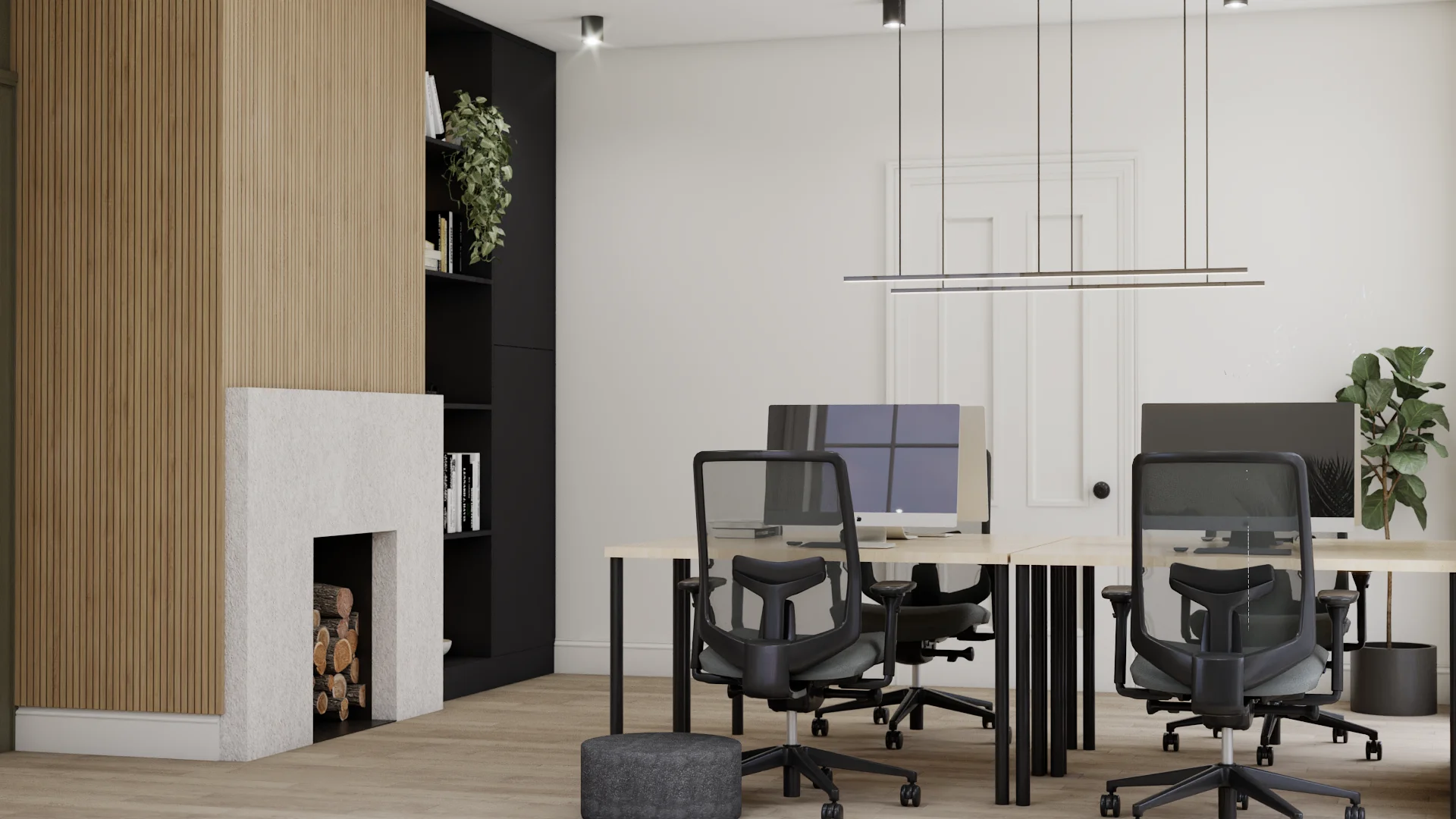 Modern office workspace with vertical oak slat accent wall, white stone fireplace with stacked logs, black built-in bookshelf, maple standing desks with black ergonomic chairs, and linear pendant lighting. Design by Debora, an online interior design service.