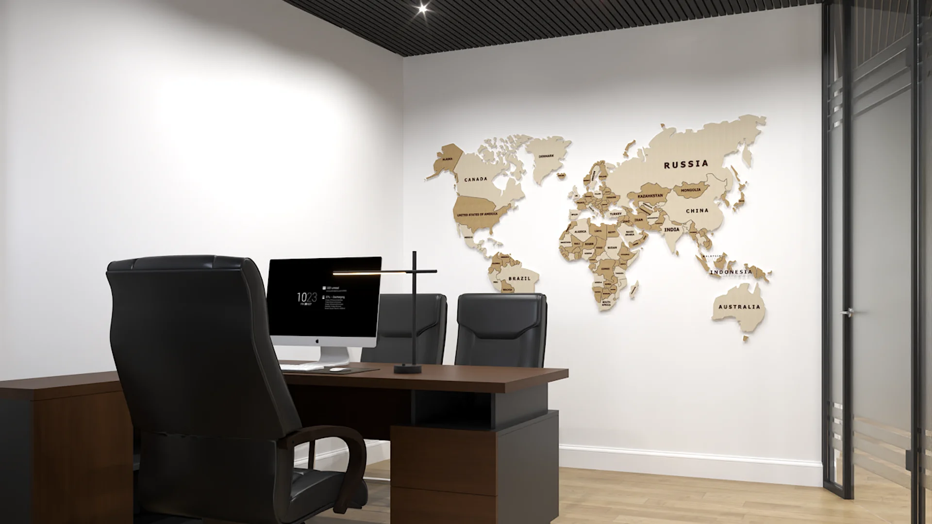 Large wooden world map wall art above dark desk with leather chair and glass partition wall
