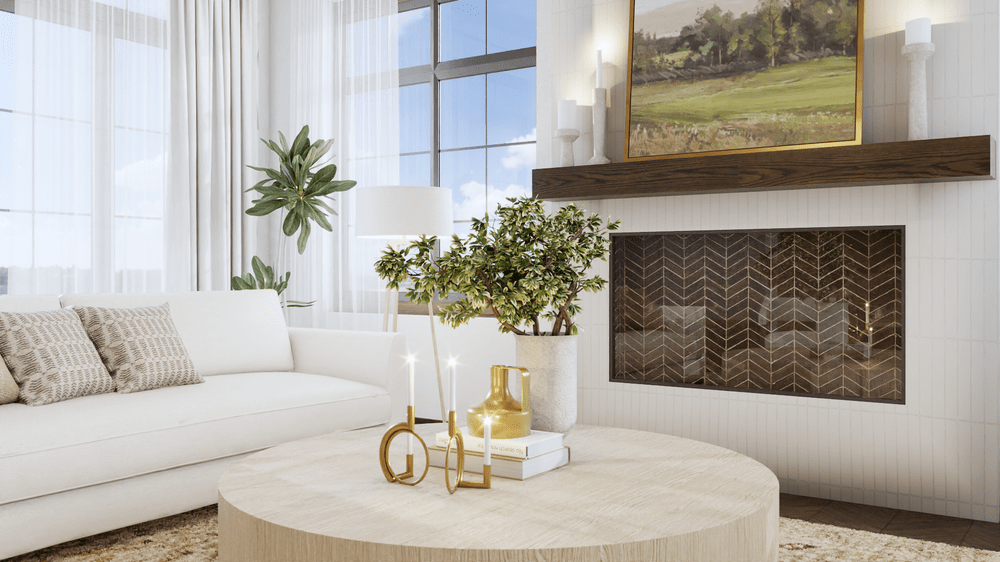 Close-up of a modern living room with a white sofa, round coffee table, and contemporary fireplace. The room is illuminated by large windows and decorated with plants and elegant candles.