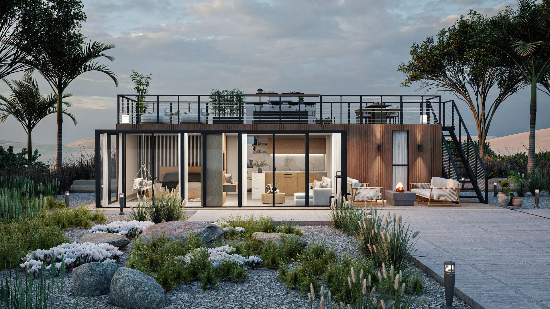 A modern container home with a spacious rooftop terrace, large windows, and contemporary design elements. The exterior is beautifully landscaped with a variety of plants and rocks, creating an inviting outdoor space. Design by Debora, an online interior design service.