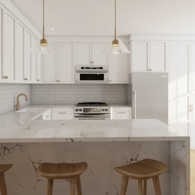 Modern white kitchen with marble countertops and golden accents, highlighting a clean and luxurious space. Design by Debora, based in New York.