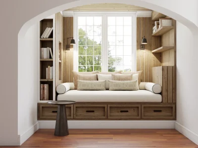 A cozy reading nook with a comfortable window seat, built-in shelves filled with books, and warm wood tones. Soft lighting and a serene view outside enhance the relaxing atmosphere. Design by Debora, an online interior design service.