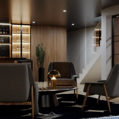 A contemporary lounge with sleek gray chairs, a modern bar with wooden cabinetry, and ambient lighting. The design includes a black and white rug and a gold accent lamp. Design by Debora, an online interior design service.