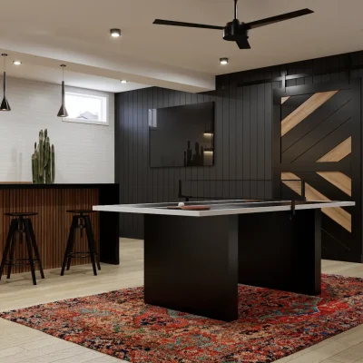 A modern game room with a sleek ping pong table, stylish bar with pendant lights, and a vibrant rug. The dark paneling and geometric design elements add to the sophisticated ambiance. Design by Debora, an online interior design service.
