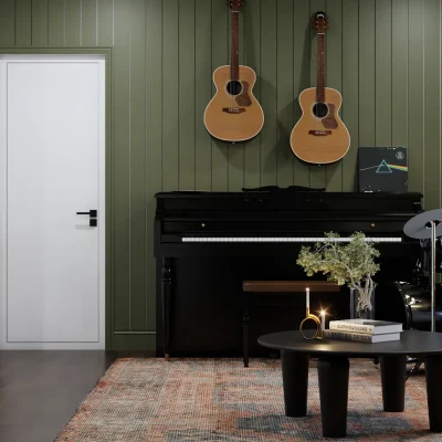 A modern music room with green walls, a black piano, and two hanging guitars. The room includes a cozy seating area and soft lighting, perfect for musical creativity. Design by Debora, an online interior design service.