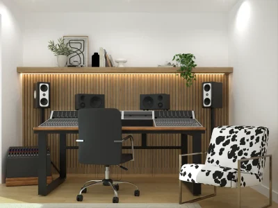 A modern recreational room featuring acoustic panels, a professional mixing desk, and a stylish black and white cow-print chair. Shelving holds decor and books, and soft lighting enhances the workspace. Design by Debora, an online interior design service.