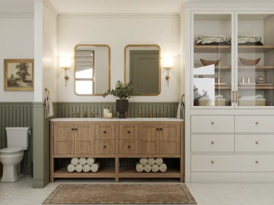 Vintage-inspired bathroom with dual wooden vanity, classic mirrors, and green wainscoting. Functional yet elegant design by Debora, an online interior design service.