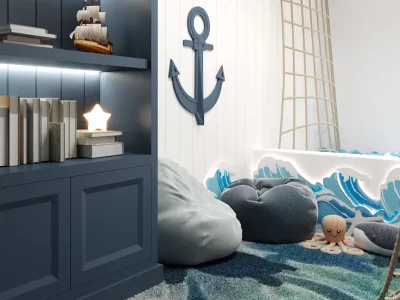 Nautical-inspired children's bedroom with anchor motifs and soft blue hues, designed by Debora, an online interior design service based in New York City.